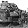 Soviet soldiers inspect a "Panther" tank captured in Uman, March 13, 1944.